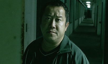 Eric Tsang dans la saga Infernal Affairs